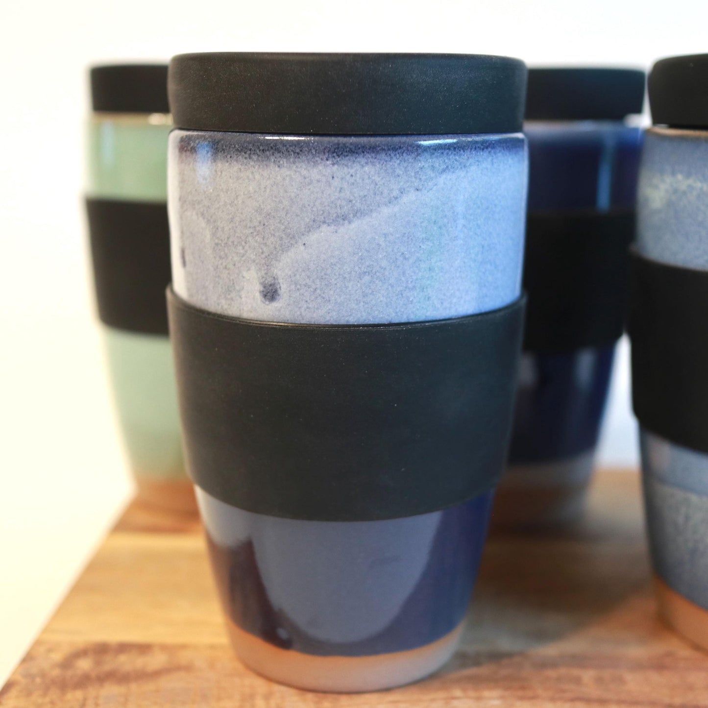 Ceramic Travel Mug With Silicone Lid. Handmade travel mug, Handmade ceramic mug, lidded coffee cup, Roam Ceramics.