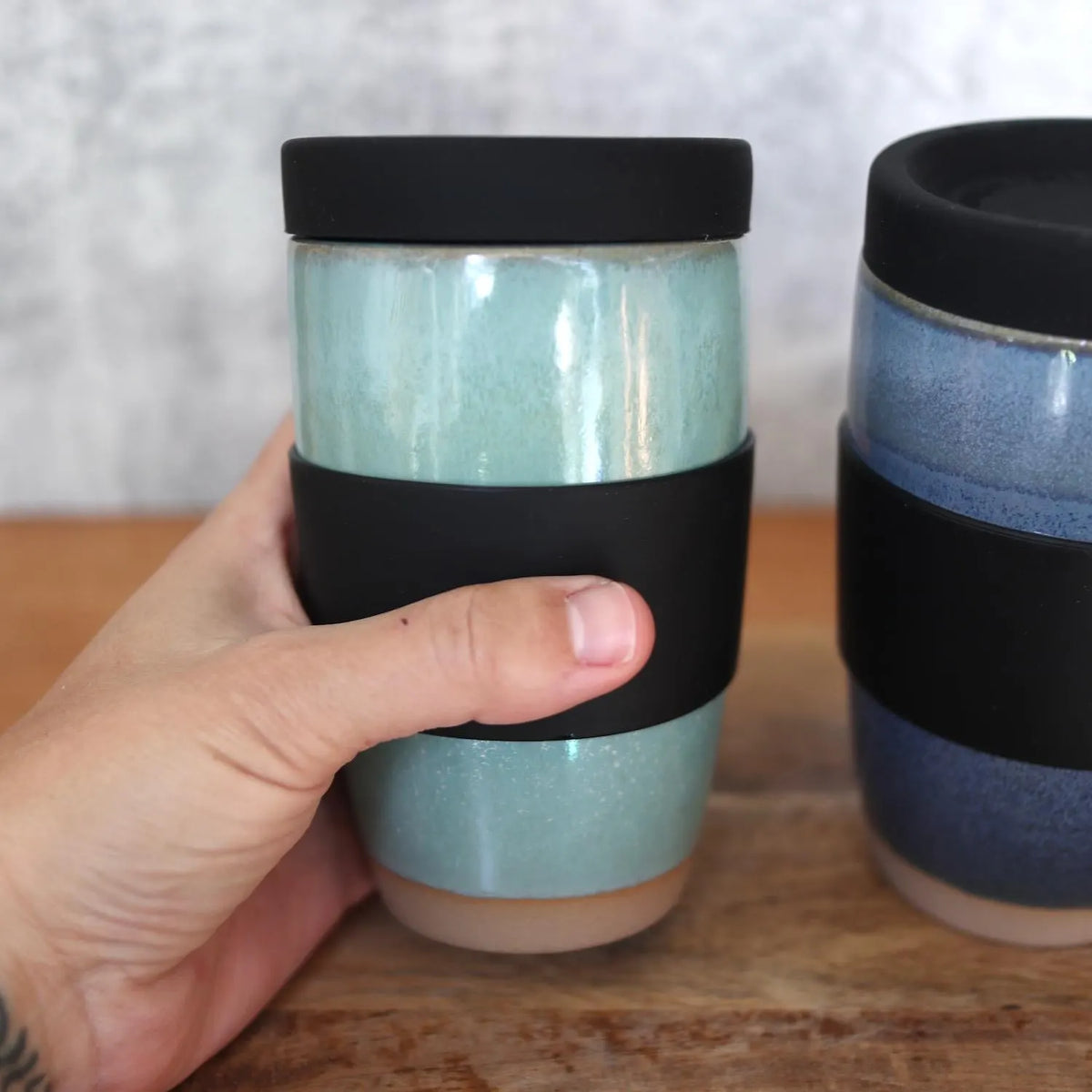 Ceramic travel mug with silicone lid. Handmade travel mug, Handmade ceramic mug, lidded coffee cup, Roam Ceramics.